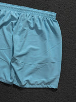 BERMUDA NK SWOOSH AZUL BEBÊ/BRANCA