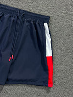 BERMUDA TOMMY AZUL M./VERMELHA