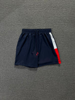 BERMUDA TOMMY AZUL M./VERMELHA