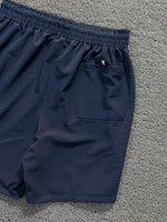 BERMUDA TOMMY AZUL M./VERMELHA
