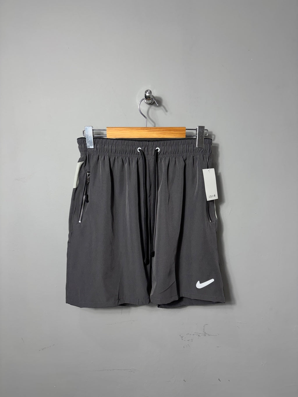 Bermuda NK Swoosh Emborrachado CNZ/C